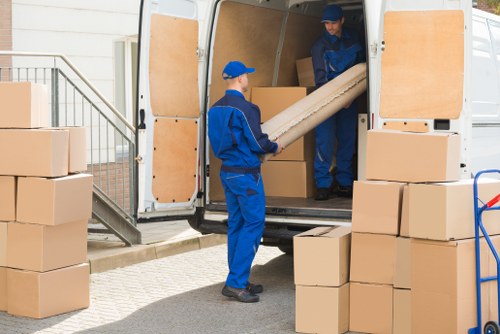 Removal team working in a Bayswater street with residential properties
