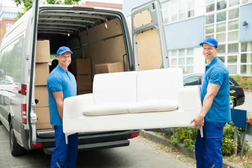 Removal team planning a move in a Bayswater street