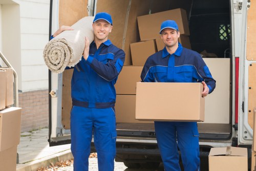 Packed moving boxes and furniture ready for transport by Bayswater removalists