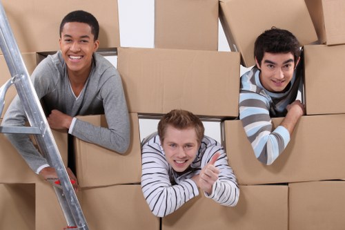 Man and van team preparing items safely for loading