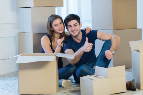 Organized packing materials and labelled moving boxes in Bayswater