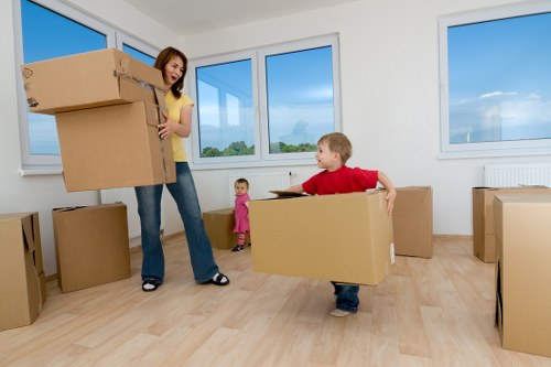 Office furniture and boxes being moved in Bayswater