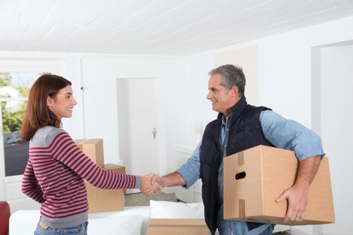 Packed boxes and furniture ready for removal in Bayswater