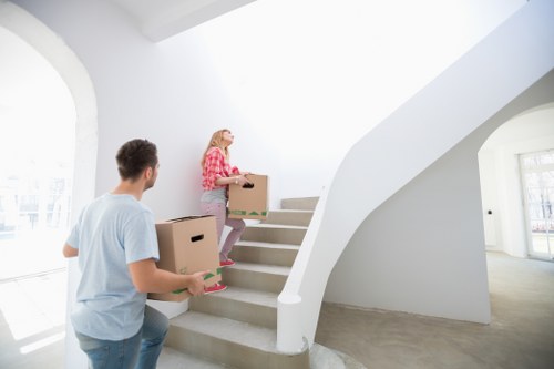 Specialist movers preparing a grand piano for transport in Bayswater