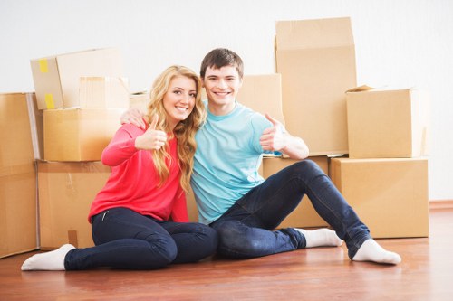 Office furniture removals in Bayswater with desks and chairs being moved