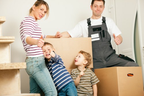 Worker using safe lifting technique during a move
